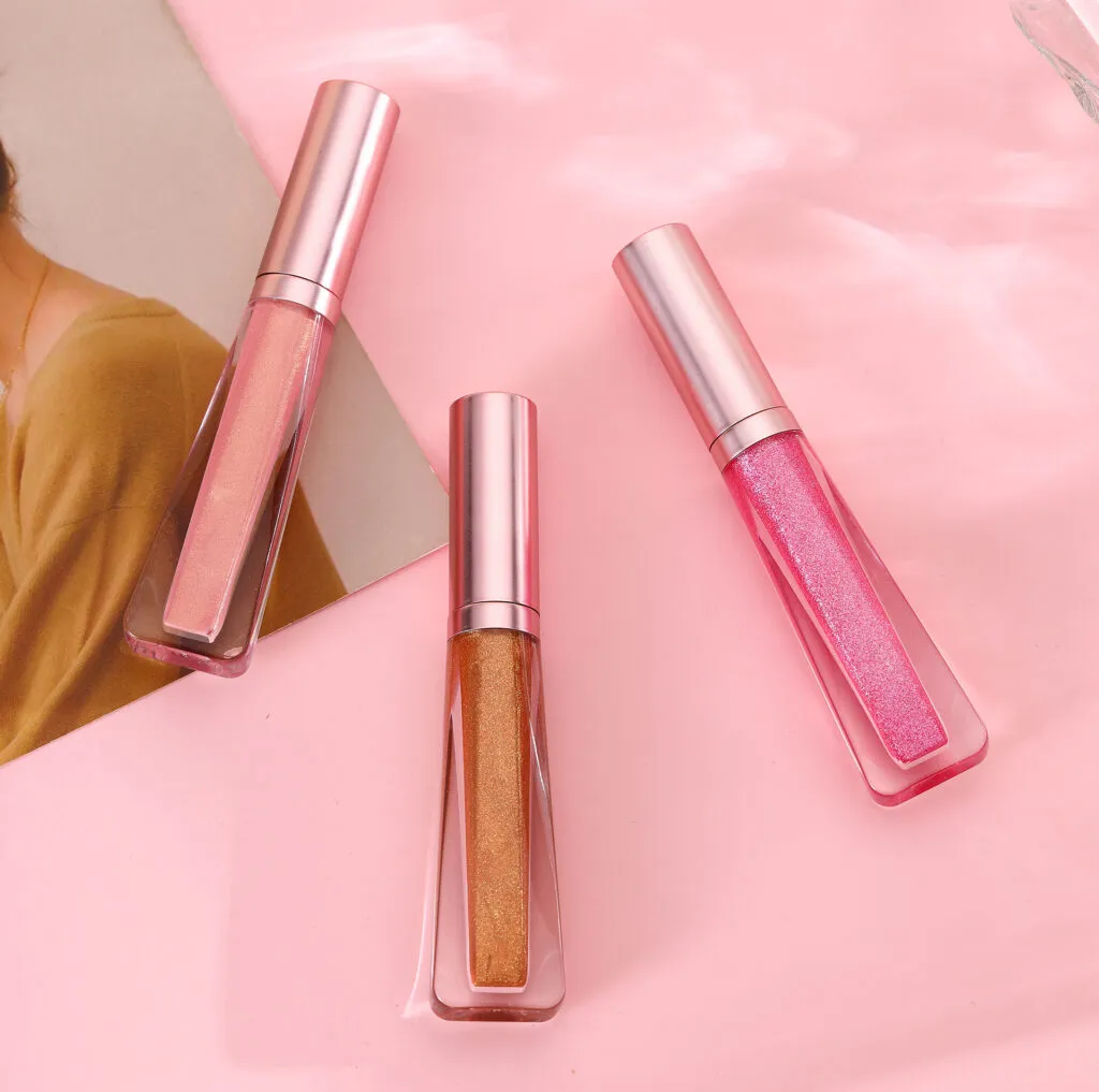 Wholesale sparkly & shimmer lip gloss no label with Rose gold packaging | LG0371