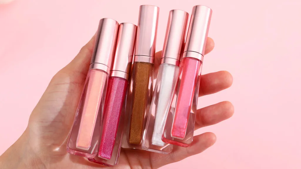 Wholesale sparkly & shimmer lip gloss no label with Rose gold packaging | LG0371
