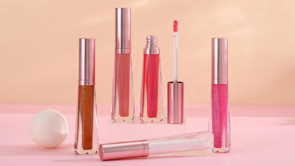 Wholesale sparkly & shimmer lip gloss no label with Rose gold packaging | LG0371