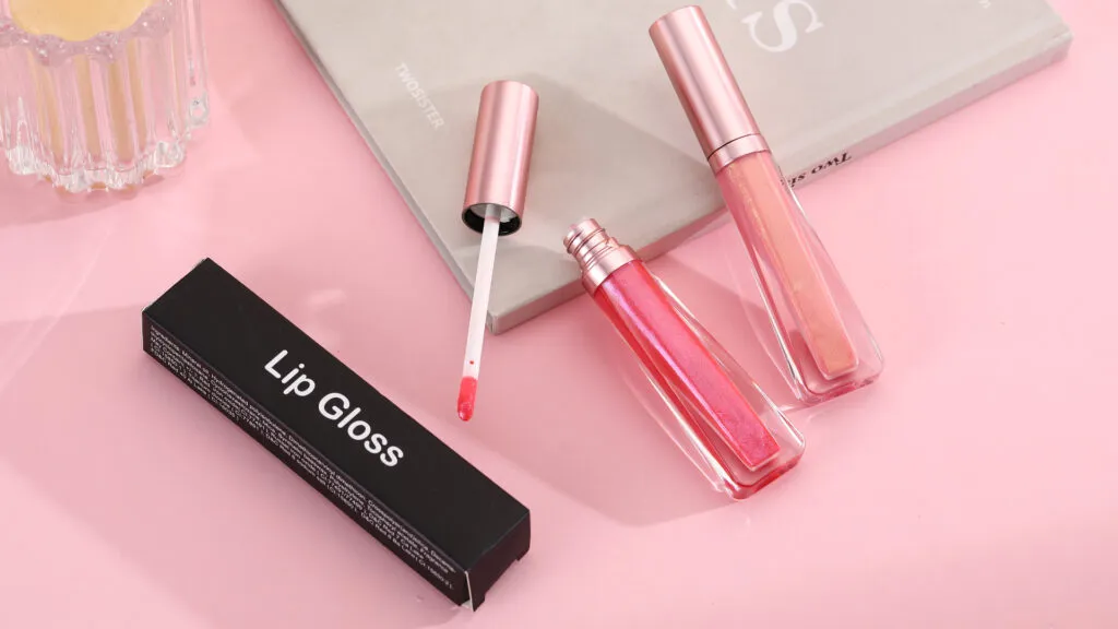 Wholesale sparkly & shimmer lip gloss no label with Rose gold packaging | LG0371